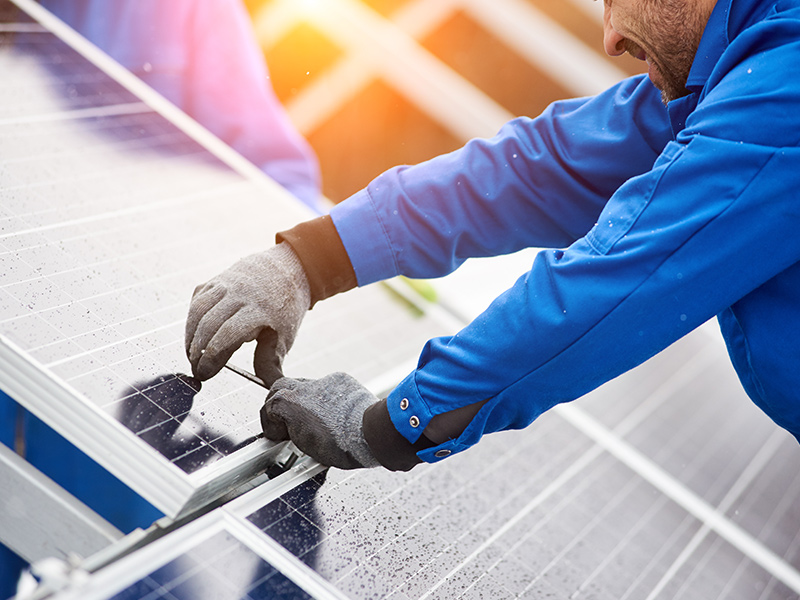 technician installing solar panels at residential property ripon ca